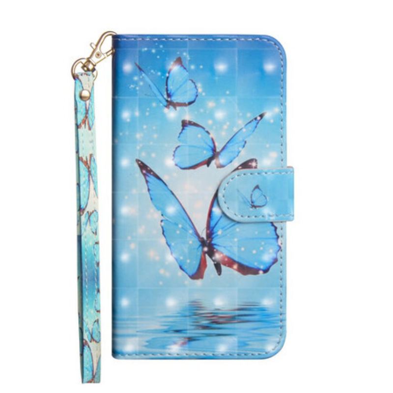 Housse iPhone 12 Pro Max Papillons Bleus Volants