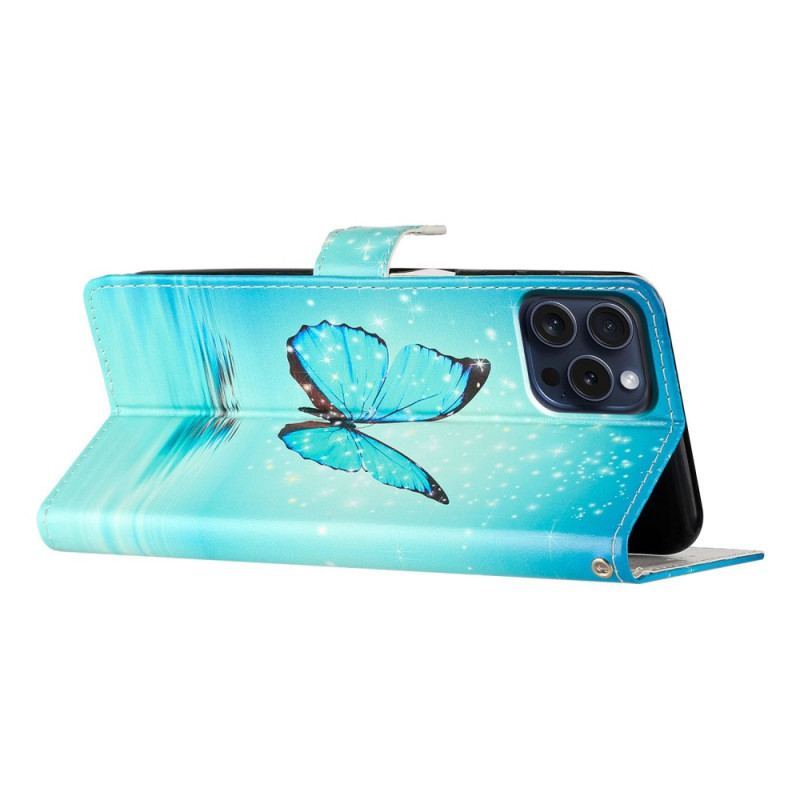 Housse iPhone 16 Pro Max Papillon Bleu sur l'Eau à Lanière