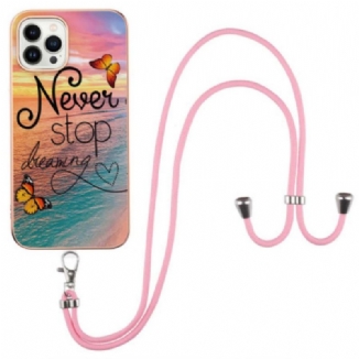 Coque iPhone 15 Pro Max à Cordon Never Stop Dreaming
