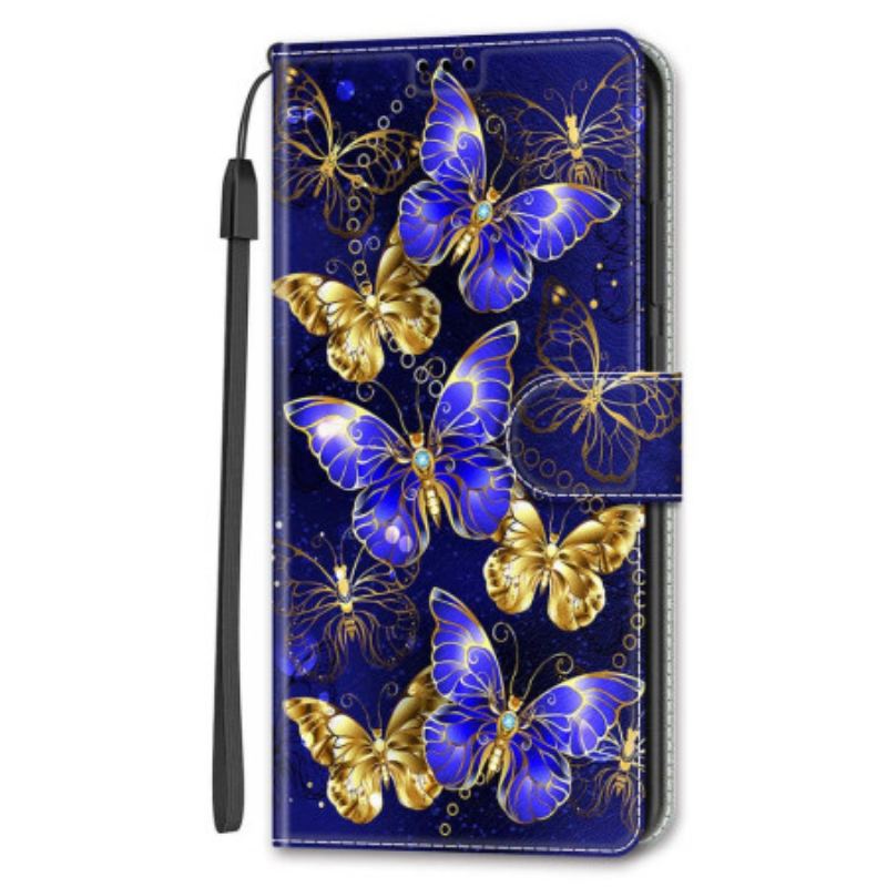 Housse Samsung Galaxy S24 5G Papillons Dorés et Bleus à Lanière