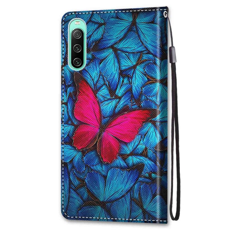 Housse Sony Xperia 10 IV Papillon Rouge Sur Fond Bleu