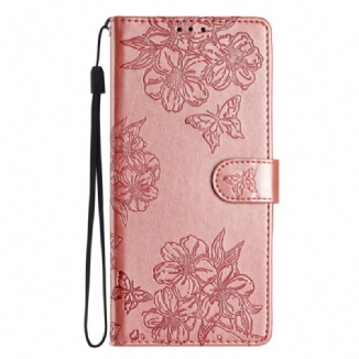 Housse iPhone 16 Motif Papillons et Fleurs