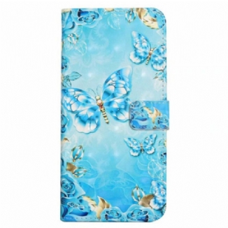 Housse iPhone 16 Papillons Bleus Clairs