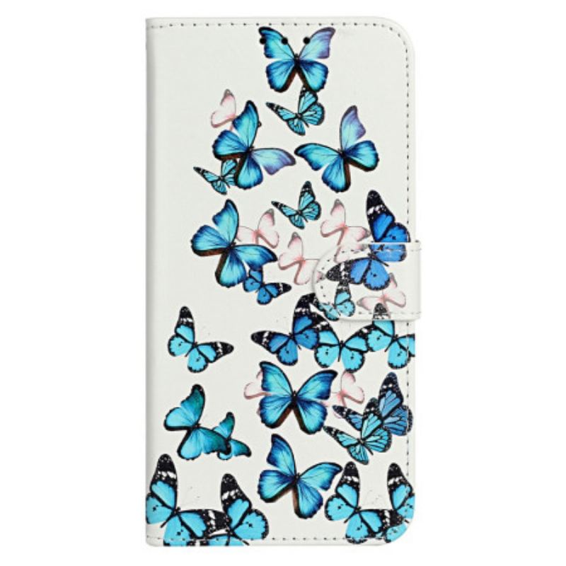 Housse iPhone 16 Plus Vol de Papillons Bleus