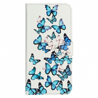 Housse iPhone 16 Plus Vol de Papillons Bleus