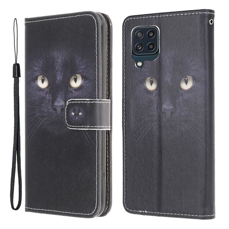 Housse Samsung Galaxy M32 Yeux de Chat Noir à Lanière