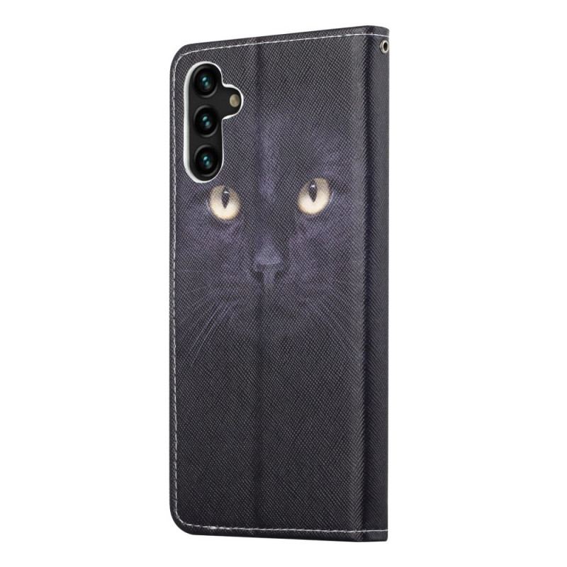 Housse Samsung Galaxy A13 5G / A04s Yeux de Chat Noir à Lanière